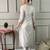 Women's white georgette kurta set with floral dupatta, embroidered yoke, 3/4 sleeves