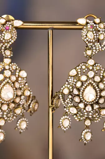 Gold plated silver polki jhumkas in sterling silver