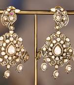 Gold plated silver polki jhumkas in sterling silver