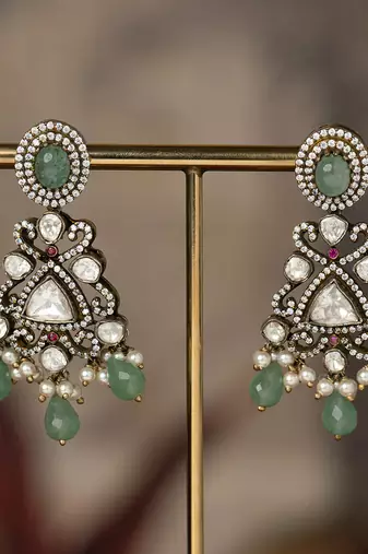 Gold plated green beads jhumkas in sterling silver