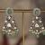 Gold plated green beads jhumkas in sterling silver