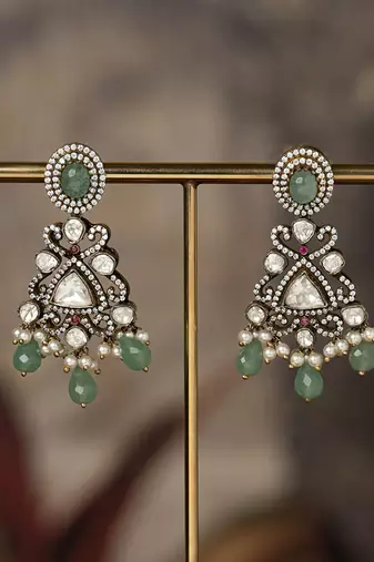Gold plated green beads jhumkas in sterling silver