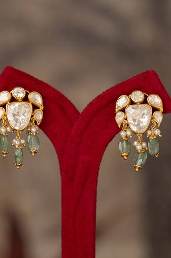 Gold plated green polki jhumkas in sterling silver