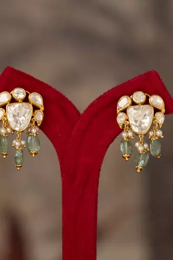 Gold plated green polki jhumkas in sterling silver