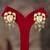 Gold plated green polki jhumkas in sterling silver