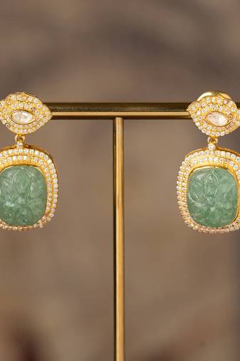 Gold plated green stone polki jhumkas in sterling silver