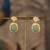 Gold plated green stone polki jhumkas in sterling silver