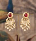 Gold plated red stone jhumkas in sterling silver