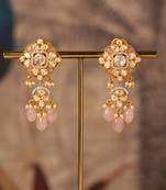 Gold plated pink polki jhumkas in sterling silver