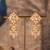Gold plated pink polki jhumkas in sterling silver