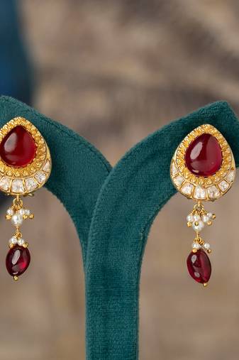 Gold plated red stone polki jhumkas in sterling silver
