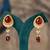 Gold plated red stone polki jhumkas in sterling silver