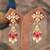 Gold plated pink beads jhumkas in sterling silver