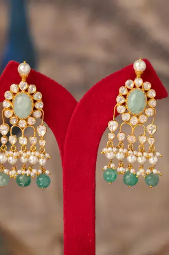 Gold plated green stone jhumkas in sterling silver