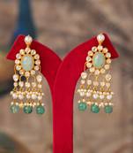 Gold plated green stone jhumkas in sterling silver