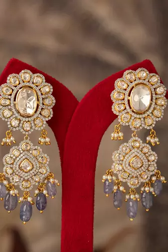 Gold plated purple beads jhumkas in sterling silver