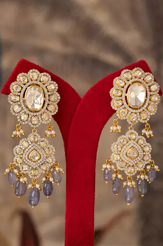 Gold plated purple beads jhumkas in sterling silver