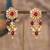 Gold plated red beads jhumkas in sterling silver