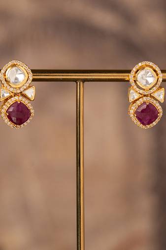 Gold plated red stone jhumkas in sterling silver