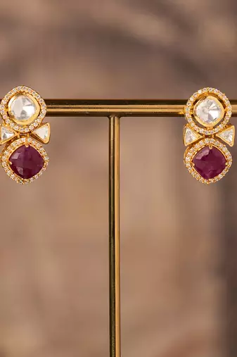 Gold plated red stone jhumkas in sterling silver