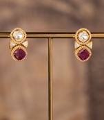 Gold plated red stone jhumkas in sterling silver