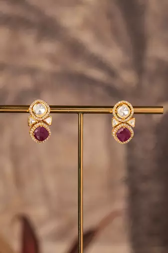 Gold plated red stone jhumkas in sterling silver
