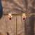 Gold plated red stone jhumkas in sterling silver
