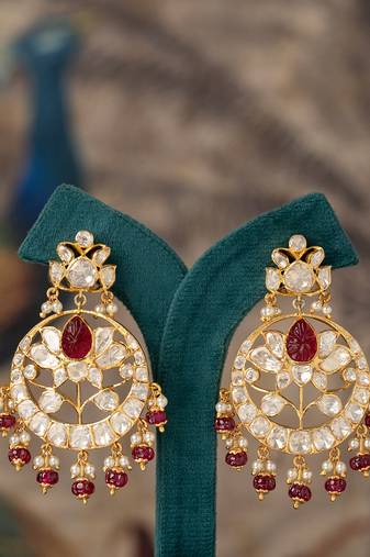 Gold plated red stone jhumkas in sterling silver