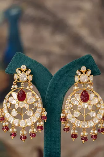 Gold plated red stone jhumkas in sterling silver