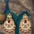 Gold plated red stone jhumkas in sterling silver