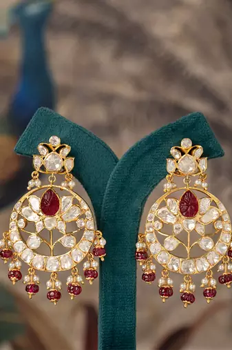 Gold plated red stone jhumkas in sterling silver