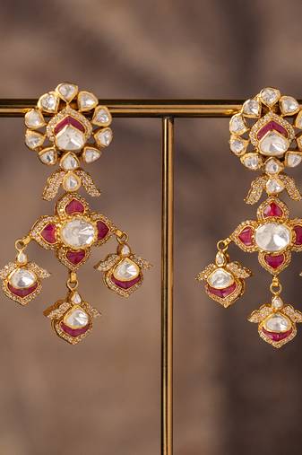Gold plated red stone jhumkas in sterling silver
