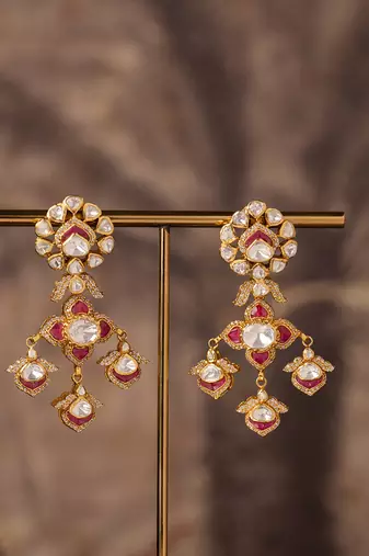 Gold plated red stone jhumkas in sterling silver