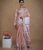 neon orange handwoven tissue saree with matte gold lace