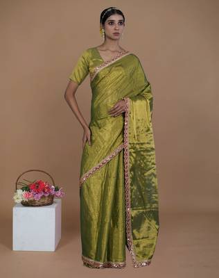 green handwoven tissue saree with scalloped lace 1