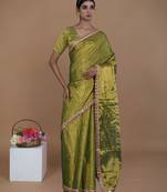 green handwoven tissue saree with scalloped lace