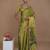 green handwoven tissue saree with scalloped lace