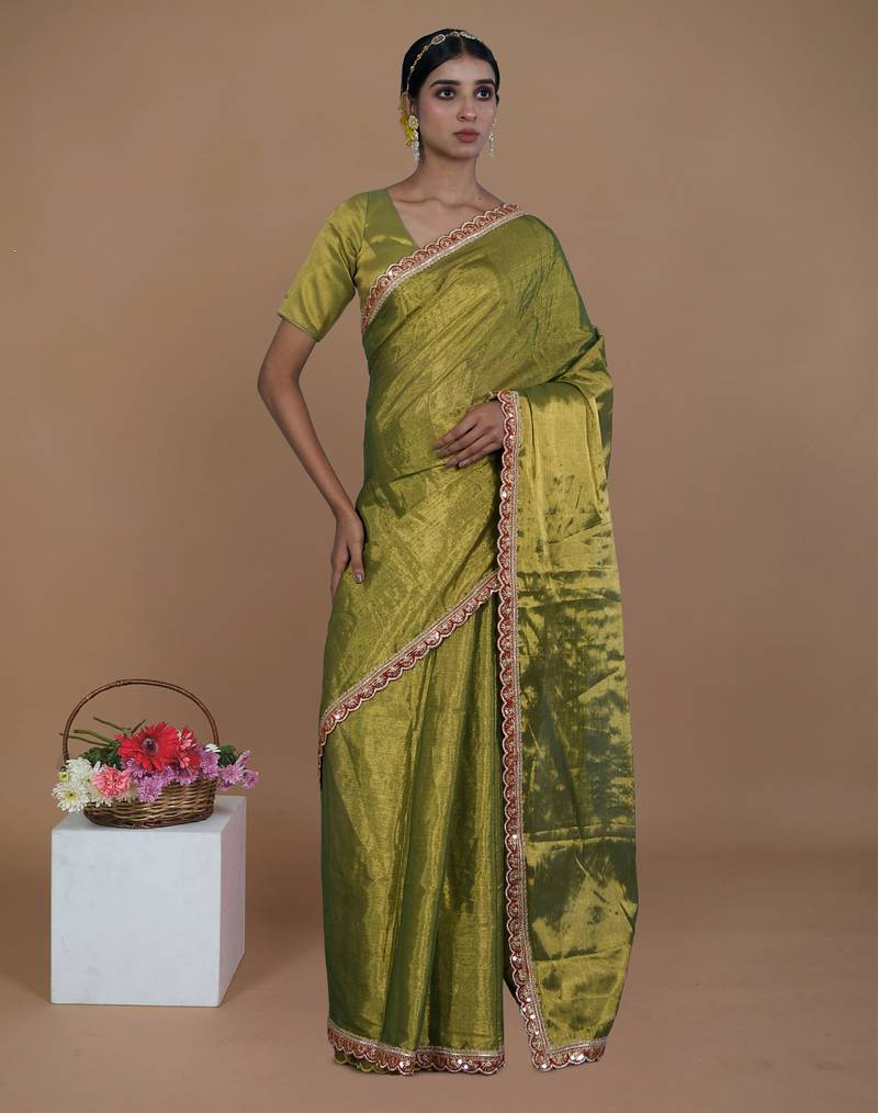 green handwoven tissue saree with scalloped lace
