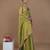 green handwoven tissue saree with scalloped lace