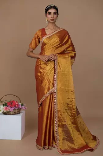 red handwoven tissue saree with scalloped lace