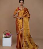 red handwoven tissue saree with scalloped lace