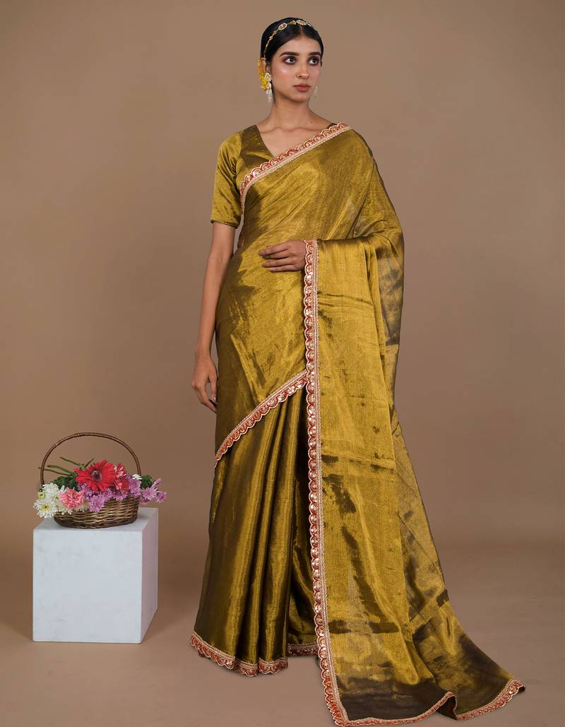 golden handwoven tissue saree with red scalloped lace