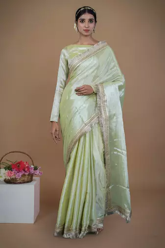olive handwoven tissue saree with matte gold lace