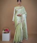 olive handwoven tissue saree with matte gold lace