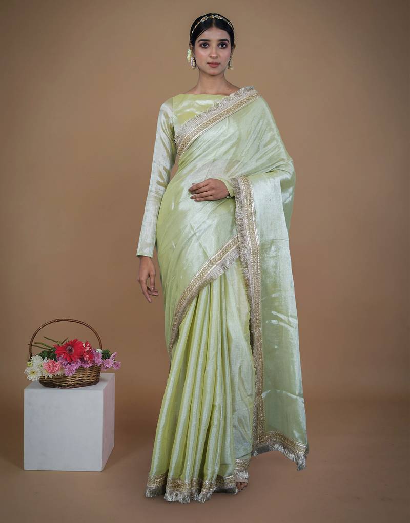 olive handwoven tissue saree with matte gold lace