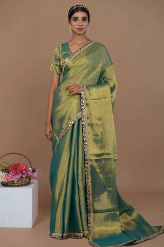 sea green handwoven tissue saree with scalloped lace