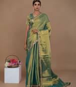 sea green handwoven tissue saree with scalloped lace