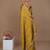 golden handwoven tissue saree with red scalloped lace