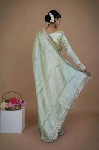 olive handwoven tissue saree with matte gold lace