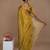 golden handwoven tissue saree with red scalloped lace